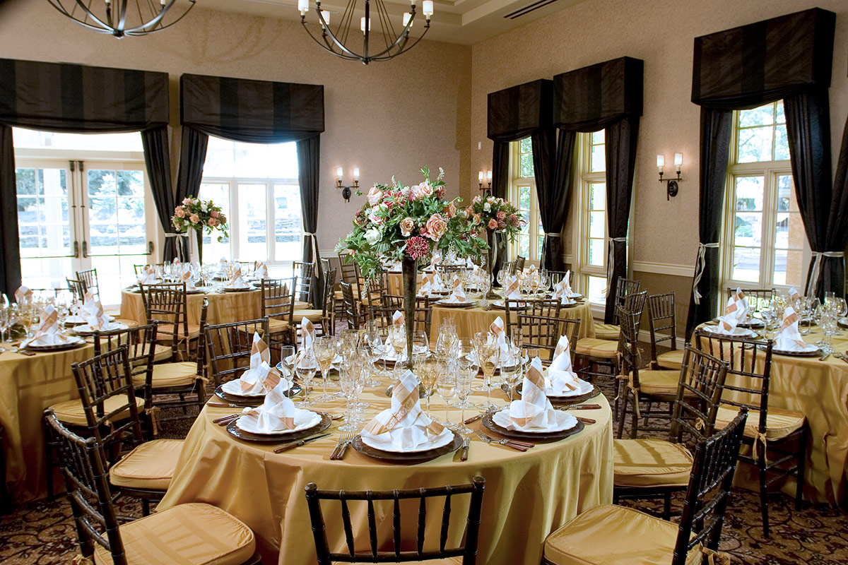 Banquet setting with table rounds for a private event in the Rose Ballroom at Vintners Resort.