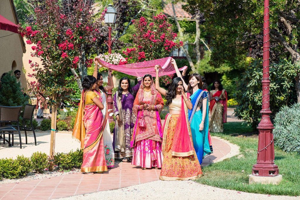 Vintners Resort Wedding Celebration on the Fontana Pavilion, featuring traditional Indian wedding attire and bridal party.